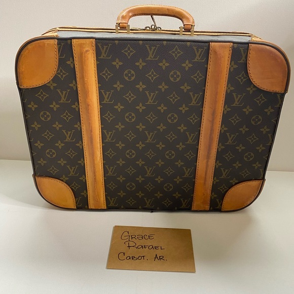 Sold at Auction: A Louis Vuitton Stratos monogram print and natural leather  suitcase, '70s